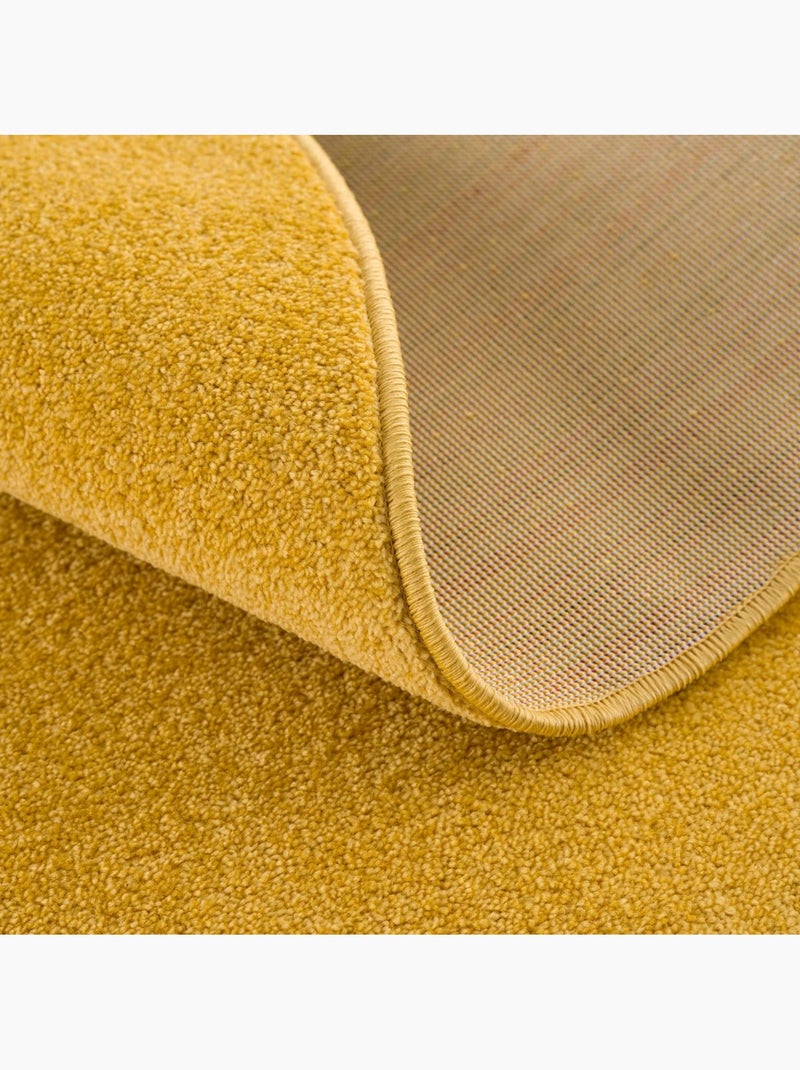 Tapis rond tissé motif uni NOSSA Jaune - Kiabi