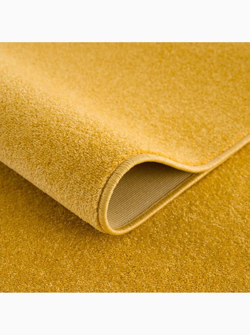 Tapis rond tissé motif uni NOSSA Jaune - Kiabi