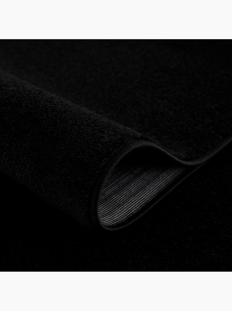 Tapis rond tissé motif uni NOSSA Noir - Kiabi