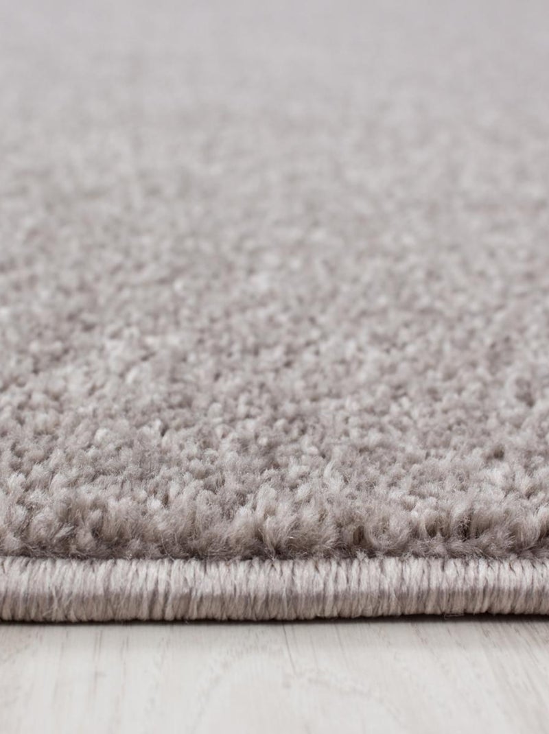 Tapis rond tissé motif uni soula Beige - Kiabi