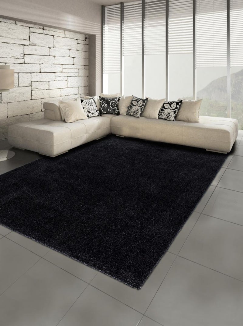 Tapis rond tissé motif uni SOULA Noir - Kiabi