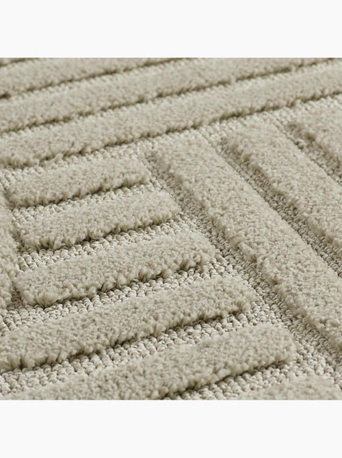 Tapis salon au motif géométrique en relief, forme ronde, noor - Kiabi Tapis salon au motif géométrique en relief, forme ronde, noor - Kiabi