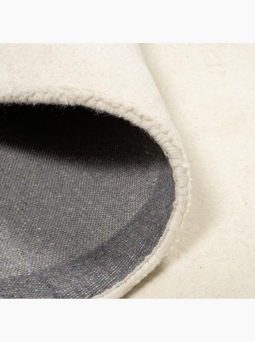 Tapis salon et chambre fait à la main en laine motif simple NOSTRAL - Kiabi