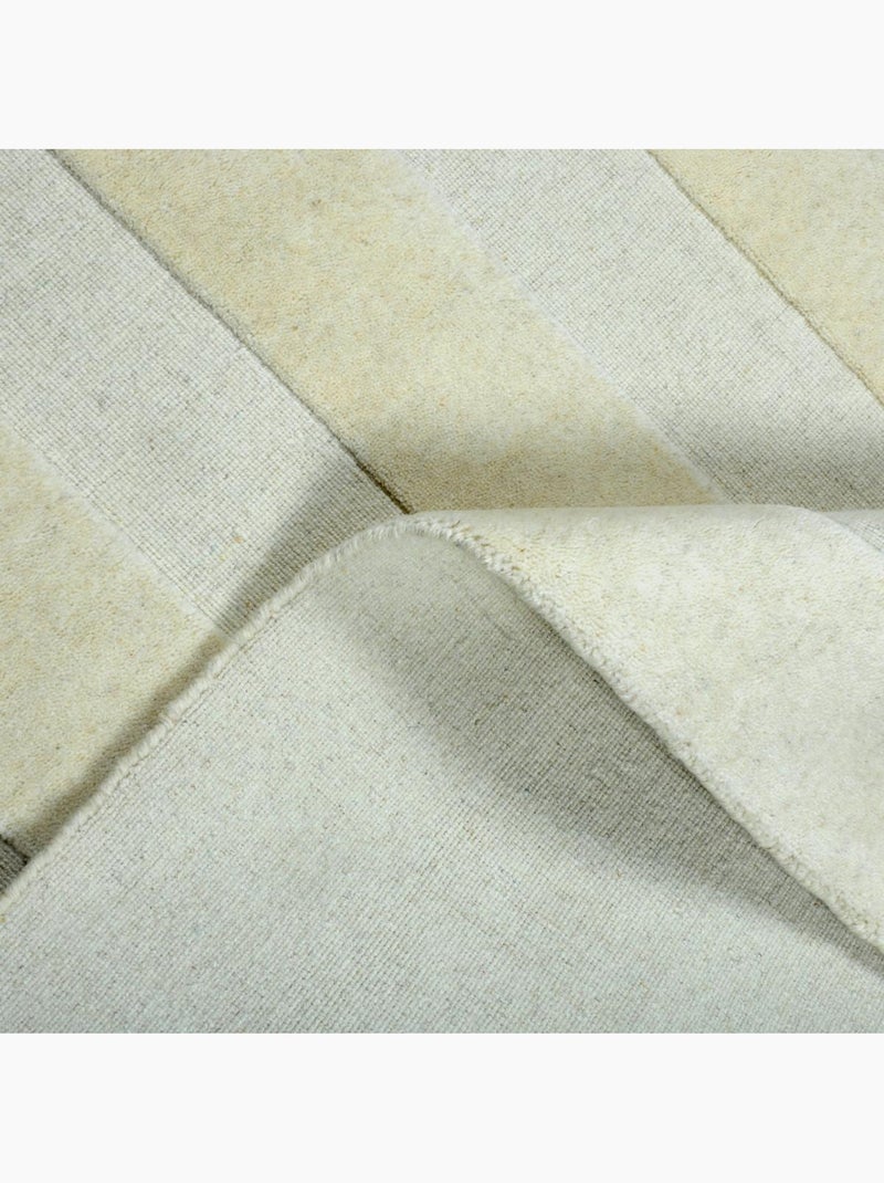 Tapis salon et chambre fait à la main en laine motif uni BANDA Beige - Kiabi