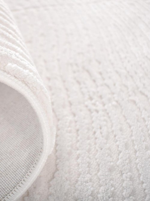 Tapis salon et chambre tissé motif faux uni DAMCIA - Kiabi