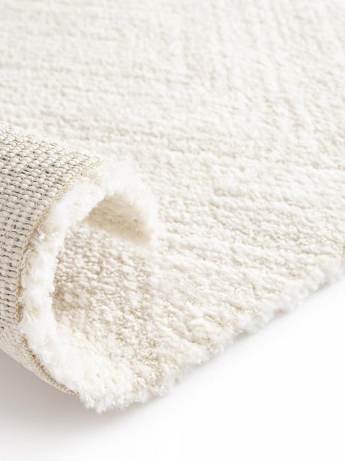 Tapis salon et chambre tissé motif faux uni NAFO 1 - Kiabi Tapis salon et chambre tissé motif faux uni NAFO 1 - Kiabi