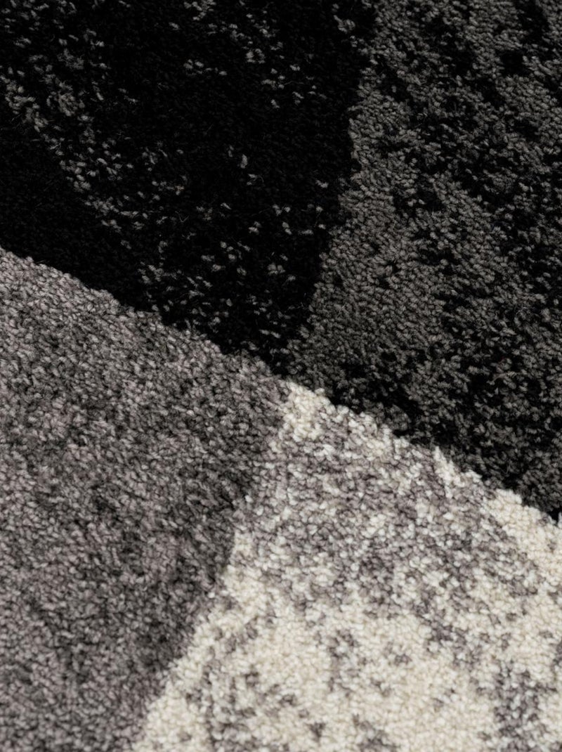 Tapis salon et chambre tissé motif géométrique FALDO Noir - Kiabi