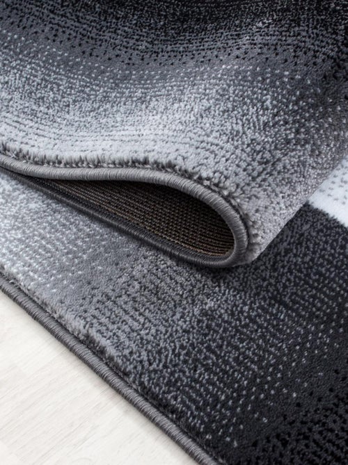 Tapis salon et chambre tissé motif géométrique FLORINA - Kiabi Tapis salon et chambre tissé motif géométrique FLORINA - Kiabi