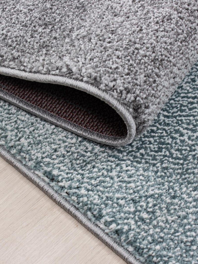 Tapis salon et chambre tissé motif géométrique KARLUK Bleu - Kiabi