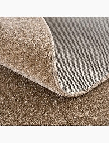 Tapis rond tissé motif uni NOSSA