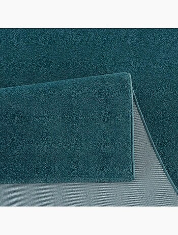 Tapis rond tissé motif uni NOSSA