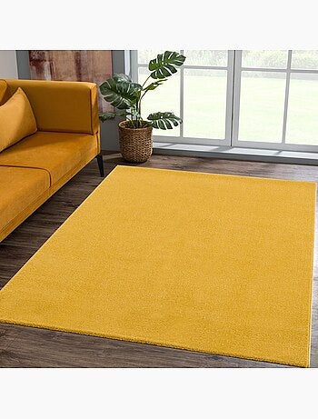 Tapis rond tissé motif uni NOSSA