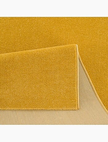 Tapis rond tissé motif uni NOSSA