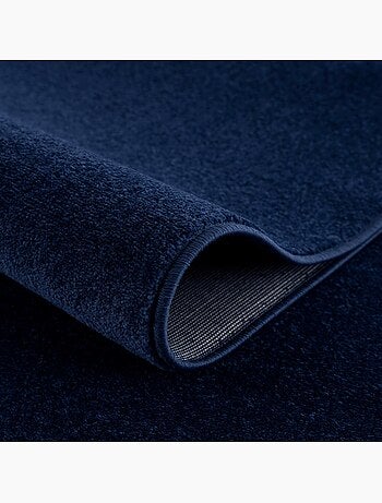 Tapis rond tissé motif uni NOSSA