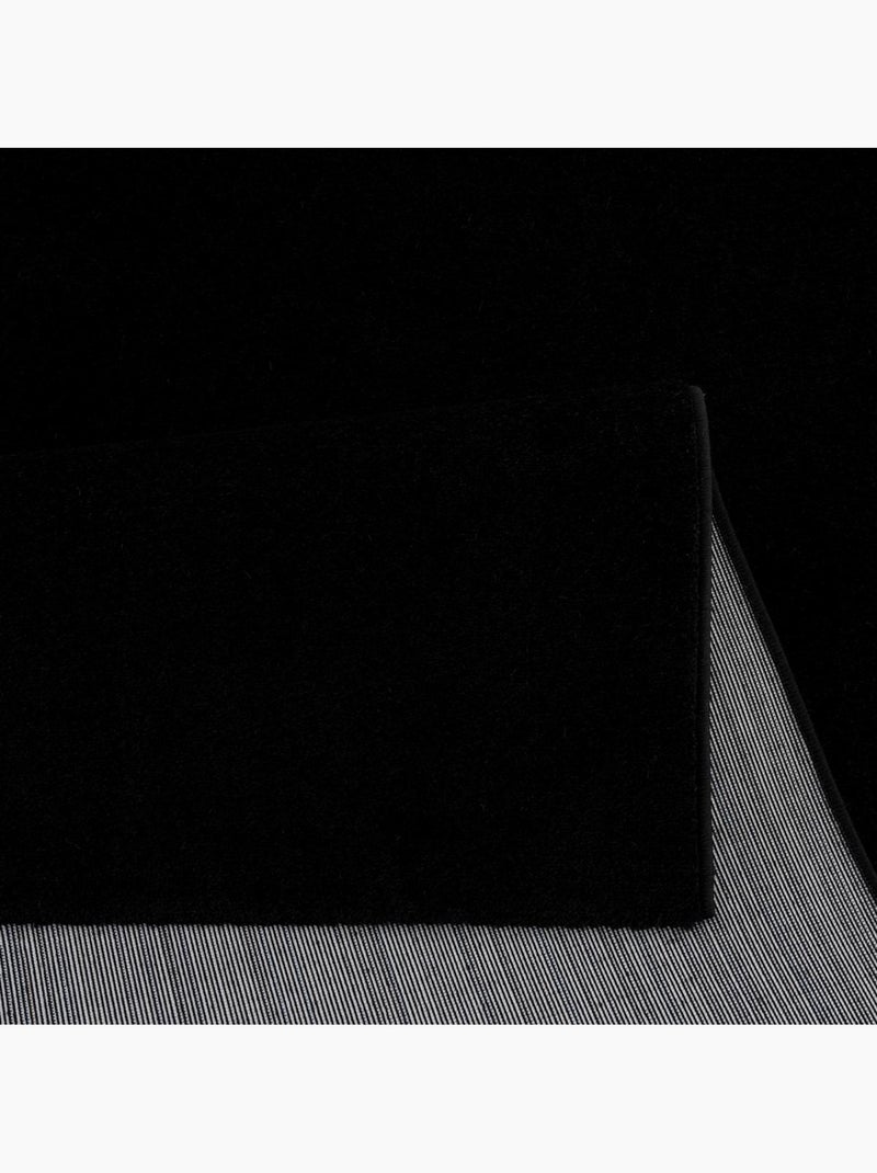 Tapis salon et chambre tissé motif uni NOSSA Noir - Kiabi