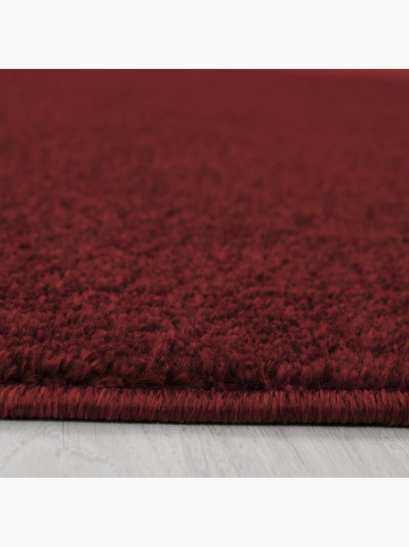 Tapis salon et chambre tissé motif uni SOULA Rouge - Kiabi