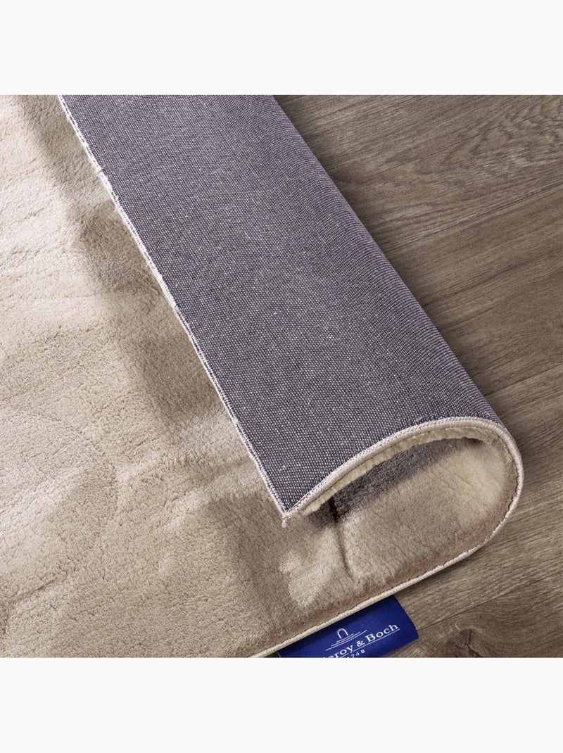 Tapis salon faux uni poils ras, tissé polyester confortable, leon Ecru - Kiabi