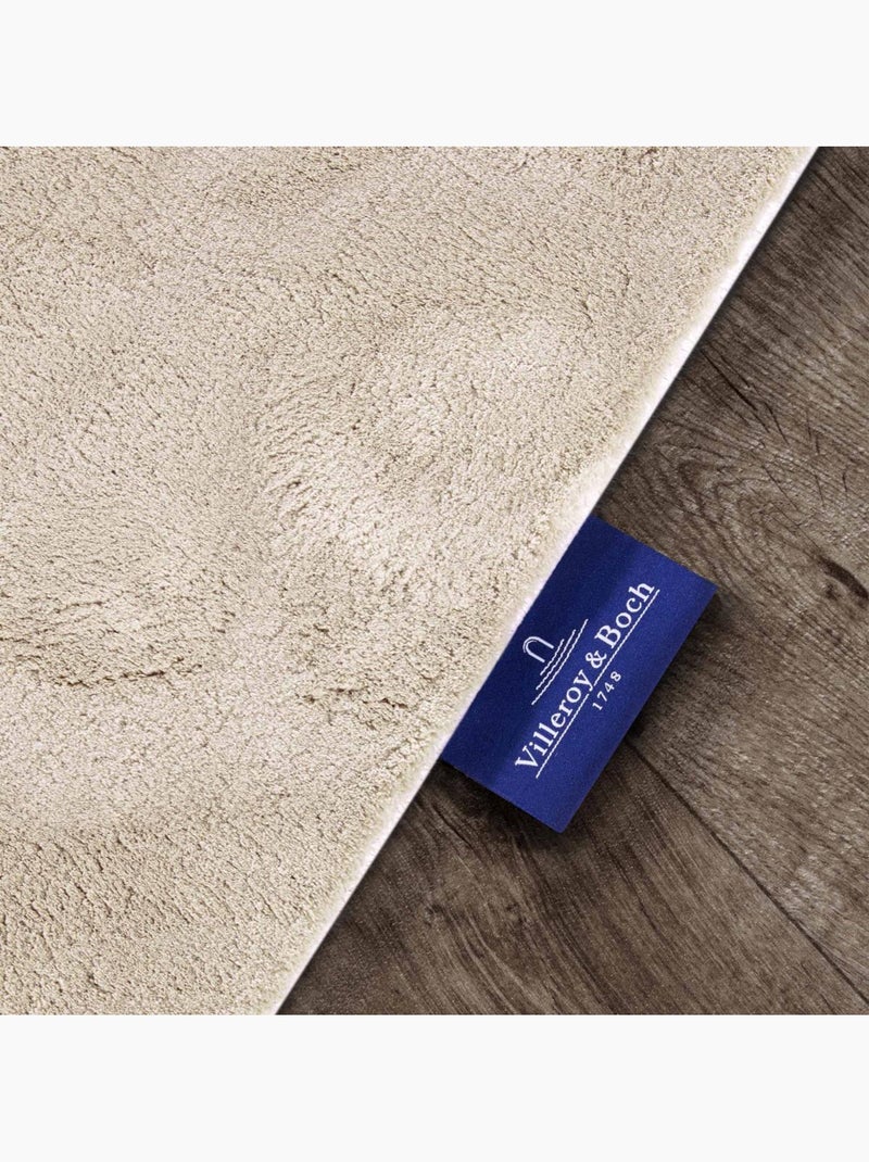 Tapis salon faux uni poils ras, tissé polyester confortable, leon Ecru - Kiabi