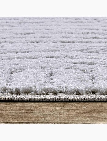 Tapis salon, motif géométrique, texture relief, panglao chaleureux