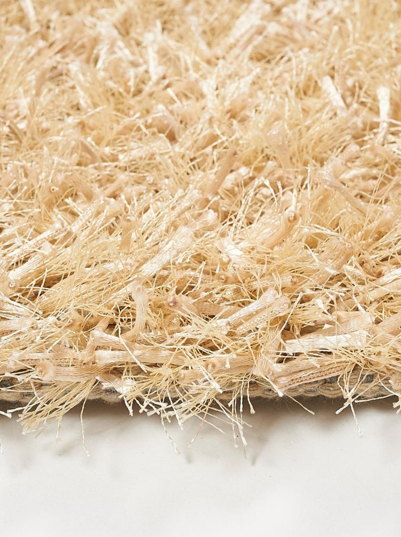 Tapis shaggy fait main motif uni GLAMOURA Beige - Kiabi