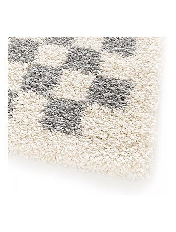 Tapis shaggy tissé motif géométrique avante