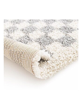 Tapis shaggy tissé motif géométrique avante