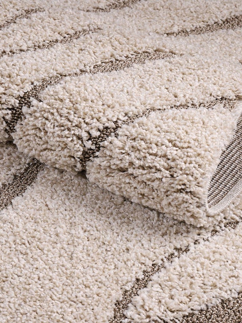 Tapis shaggy tissé motif géométrique POUDA Beige - Kiabi