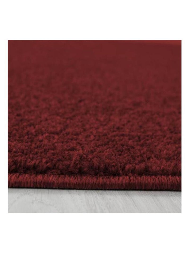 Tapis uni à courtes mèches pour salon Rush Rouge - Kiabi