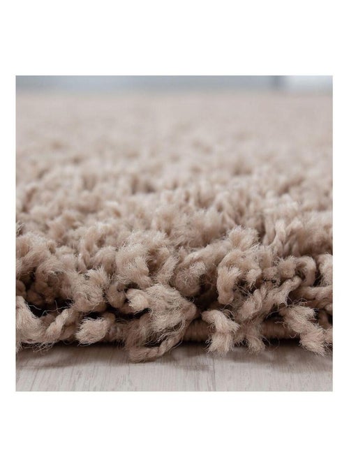 Tapis uni à longues mèches rectangle Swirls - Kiabi