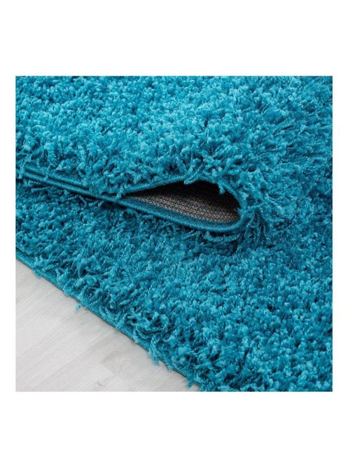 Tapis uni à longues mèches rectangle Swirls - Kiabi