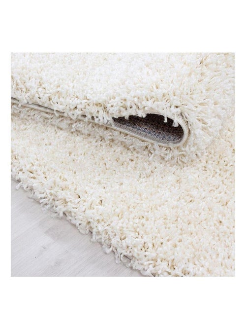 Tapis uni à longues mèches rectangle Swirls - Kiabi