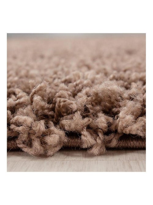 Tapis uni à longues mèches rectangle Swirls - Kiabi