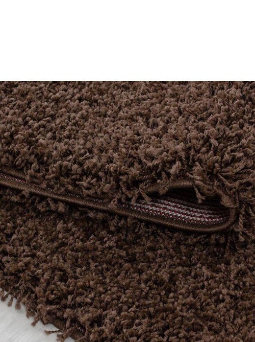 Tapis uni à longues mèches rectangle Swirls - Kiabi