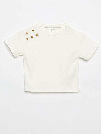 Tee-shirt à manches courtes avec fleurs sur l'épaule
