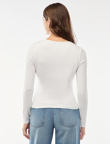 Tee-shirt à manches longues avec bijou doré devant effet twisté