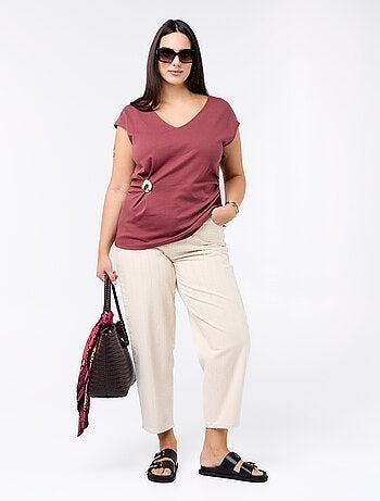 Tee-shirt drapé avec bijou doré