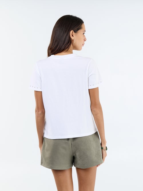 Tee-shirt en jersey avec clous au col et aux manches - Kiabi