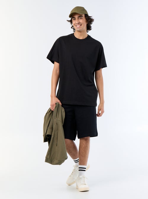 Tee-shirt uni coupe confort fit / oversize à manches courtes - Kiabi Tee-shirt uni coupe confort fit / oversize à manches courtes - Kiabi