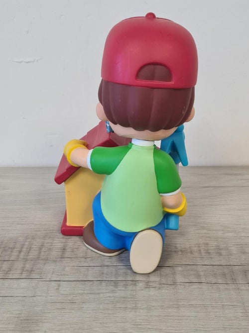 Tirelire en forme de Manny et ses outils - Kiabi