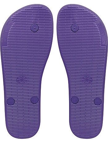 Tongs brasileras unisexes avec semelle en gomme antidérapante.