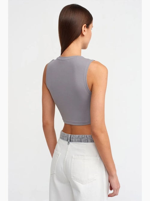 Top crop sans manches en jersey de coton dilvin - Kiabi Top crop sans manches en jersey de coton dilvin - Kiabi