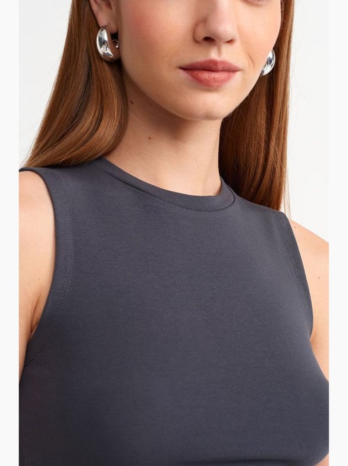 Top crop sans manches en jersey de coton dilvin - Kiabi Top crop sans manches en jersey de coton dilvin - Kiabi