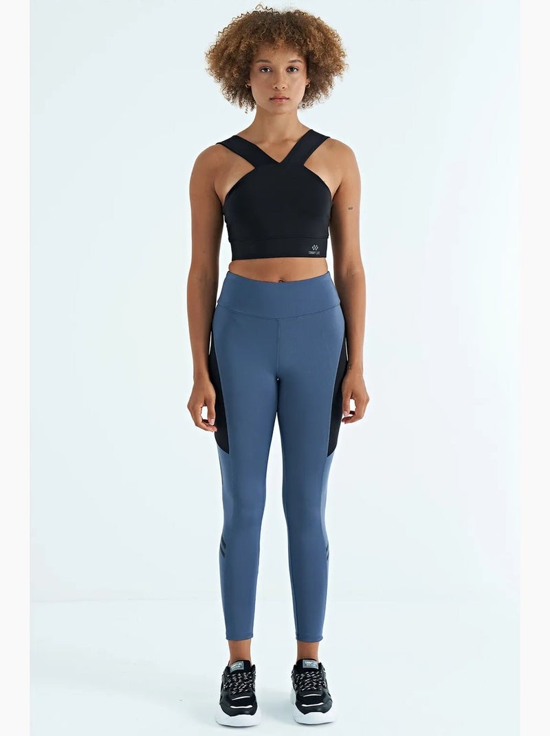 Top de sport court sans manches à col v pour femme tommy Noir - Kiabi
