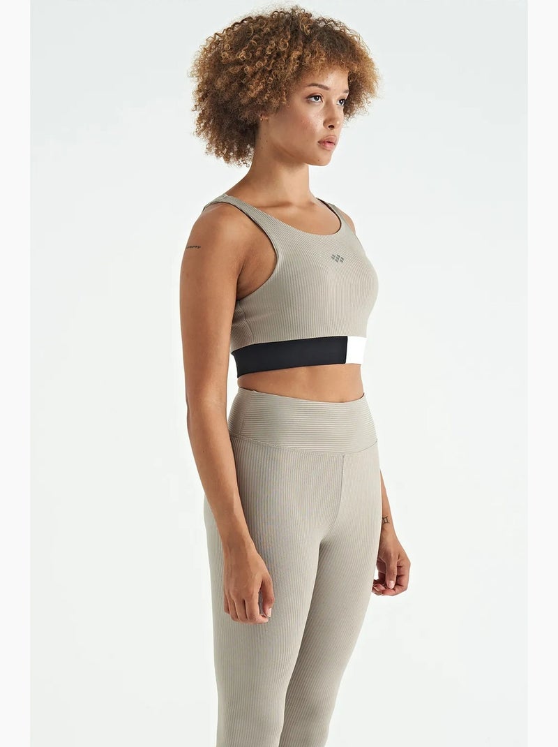 Top de sport court sans manches à color-block tommy Noir/Sable - Kiabi