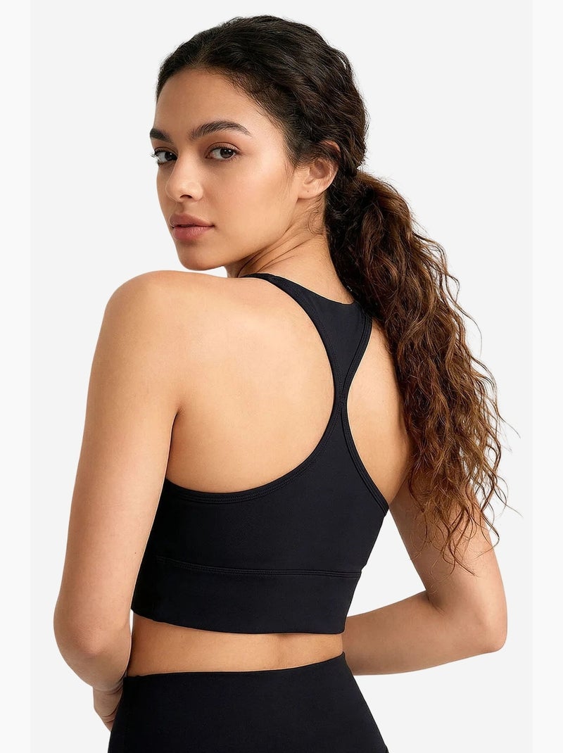 Top de sport femme court ajusté tommy Noir - Kiabi