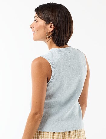 Top sans manches avec boutons dorés