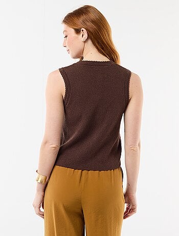 Top sans manches avec boutons dorés