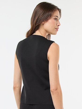 Top sans manches avec boutons dorés