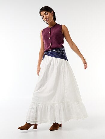 Top sans manches avec boutons dorés