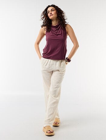 Top sans manches avec encolure drapée